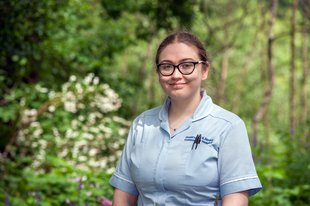 Nurse in hospice garden